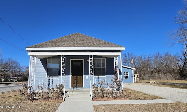 bungalow-style house featuring covered porch