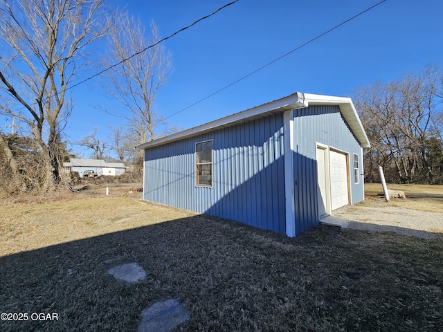 view of outdoor structure featuring a garage