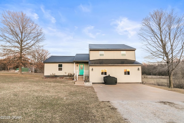 view of front of home with a front yard