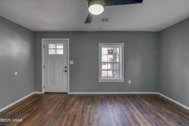 entrance foyer featuring ceiling fan and dark hardwood / wood-style flooring