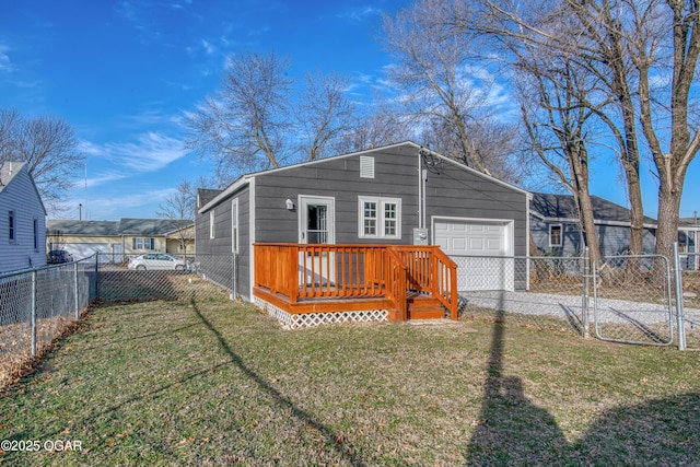 exterior space with a garage, a deck, and a front yard