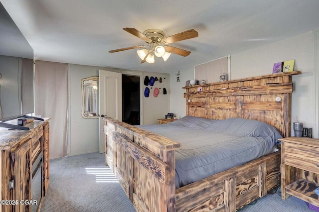 bedroom with light colored carpet and ceiling fan