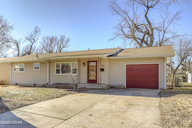 ranch-style home with a garage