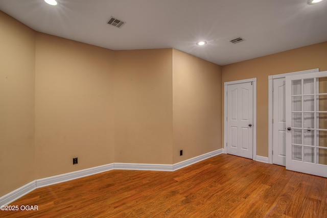 empty room featuring hardwood / wood-style floors