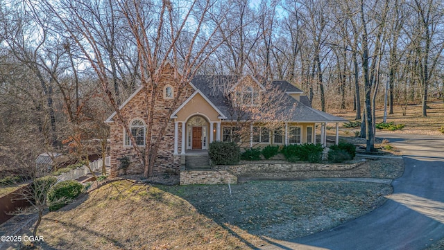 view of front of home with a front lawn