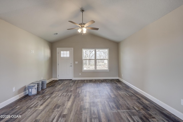 unfurnished living room with ceiling fan, lofted ceiling, and dark hardwood / wood-style flooring