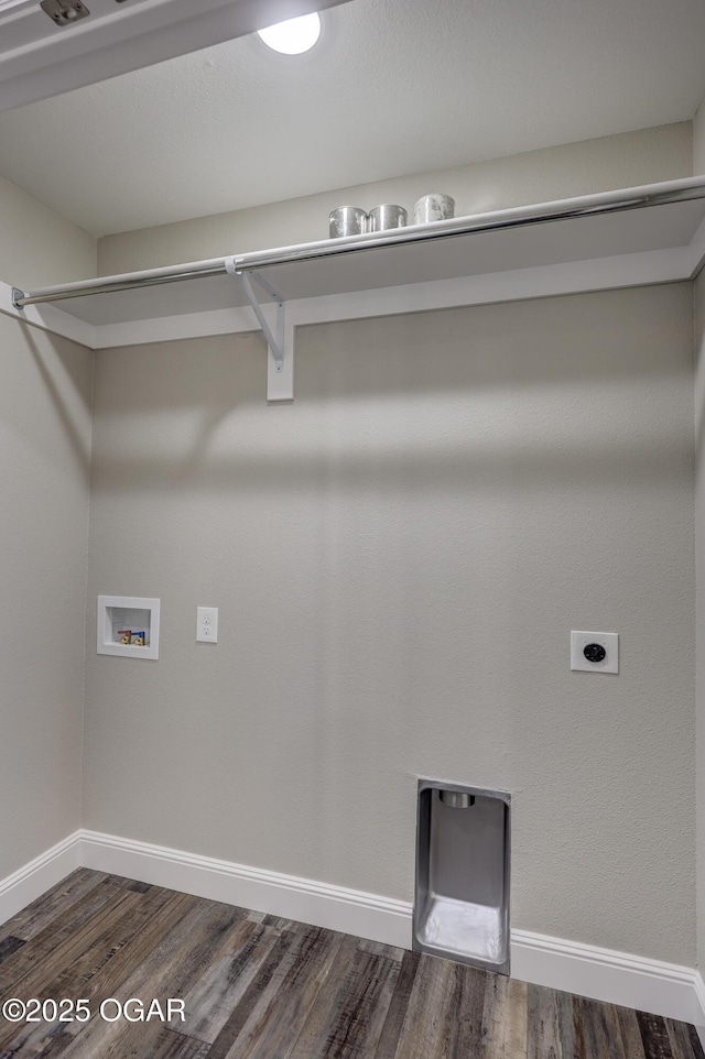 clothes washing area featuring dark wood-type flooring, hookup for a washing machine, and electric dryer hookup