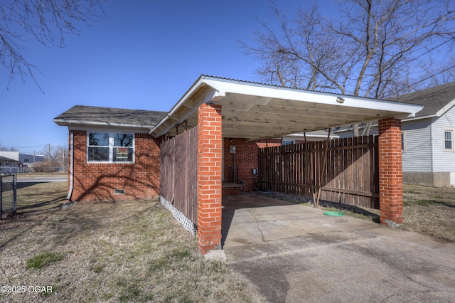 view of home's exterior featuring a carport