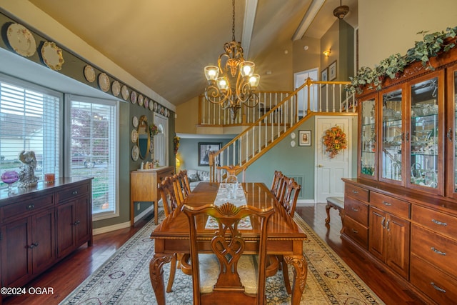 dining area with lofted ceiling, a notable chandelier, and dark hardwood / wood-style flooring