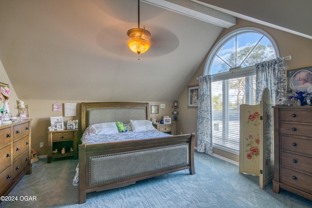 carpeted bedroom with vaulted ceiling with beams and ceiling fan