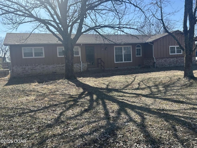 back of house with a yard