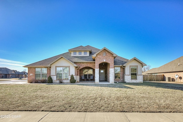 view of front of home with a front lawn