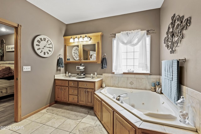 bathroom with vanity, a bath, and tile patterned floors