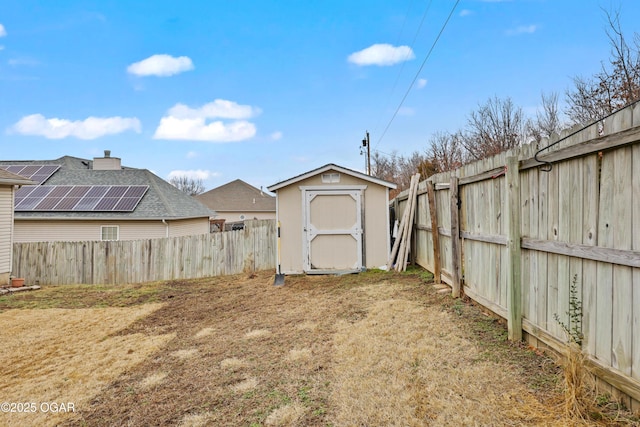 view of yard featuring a storage unit