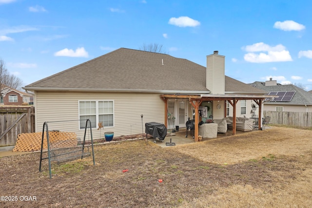 back of house featuring a patio