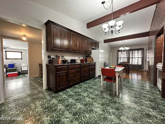 kitchen with dark brown cabinetry, white fridge, a chandelier, and lofted ceiling with beams