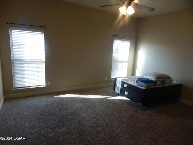 bedroom with carpet floors and ceiling fan