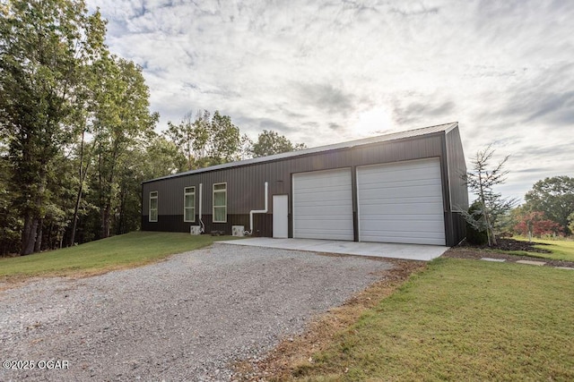 garage with a lawn