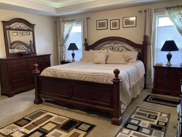 bedroom with light colored carpet