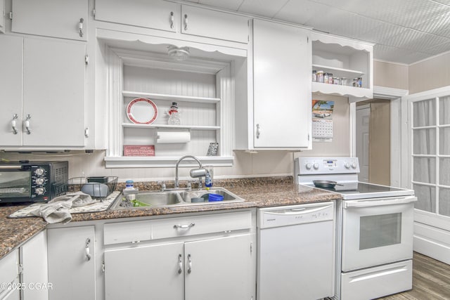 615 E 15th St, Joplin, MO 64801 - kitchen featuring white appliances, white cabinets, wood finished floors, open shelves, and a sink