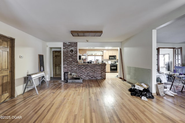 living room with light hardwood / wood-style floors