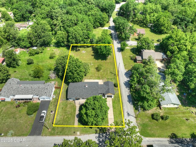 540 E 4th St, Baxter Springs, KS 66713 - aerial view of property's location with property boundaries highlighted