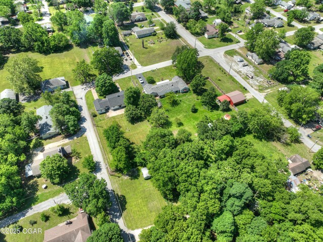 540 E 4th St, Baxter Springs, KS 66713 - aerial view of property's location with nearby suburban area