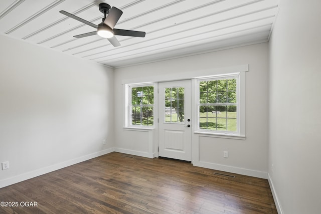 540 E 4th St, Baxter Springs, KS 66713 - empty room featuring wood finished floors, baseboards, and ceiling fan