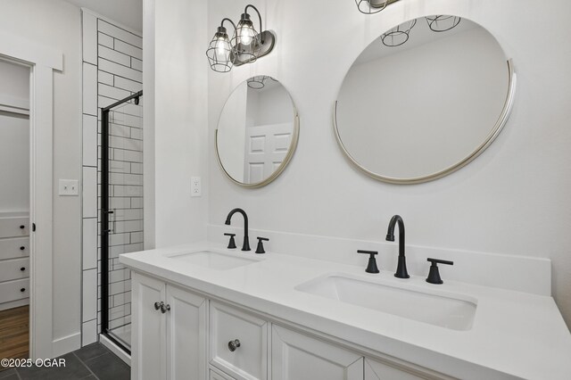 540 E 4th St, Baxter Springs, KS 66713 - full bathroom featuring double vanity, a shower, and tile patterned flooring