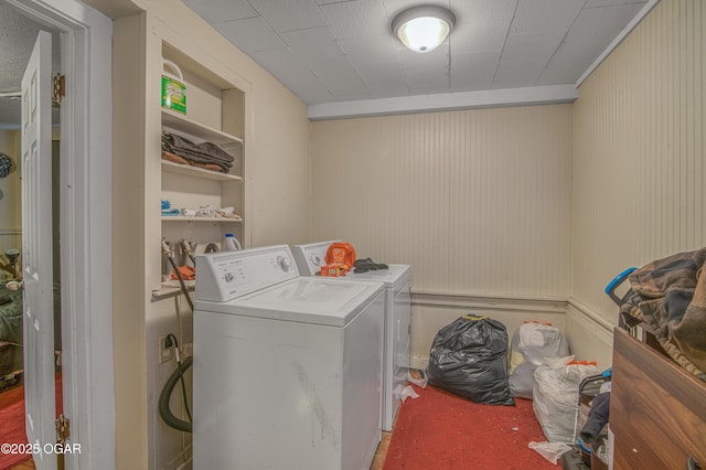 clothes washing area with washer and dryer