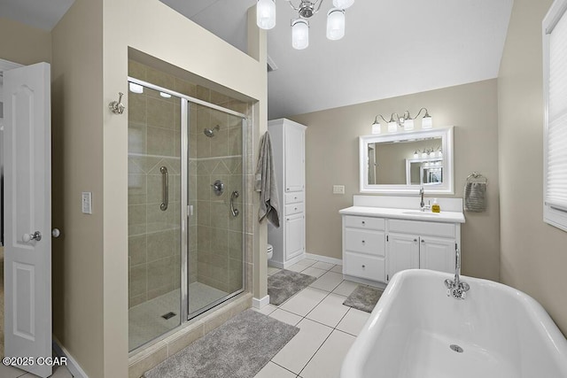 full bathroom featuring toilet, vanity, shower with separate bathtub, and tile patterned flooring