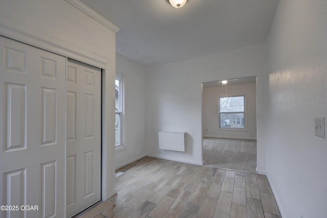 foyer entrance with light wood-type flooring