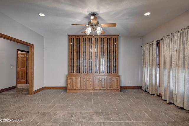 empty room with ceiling fan