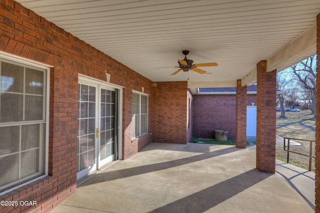 view of patio featuring ceiling fan