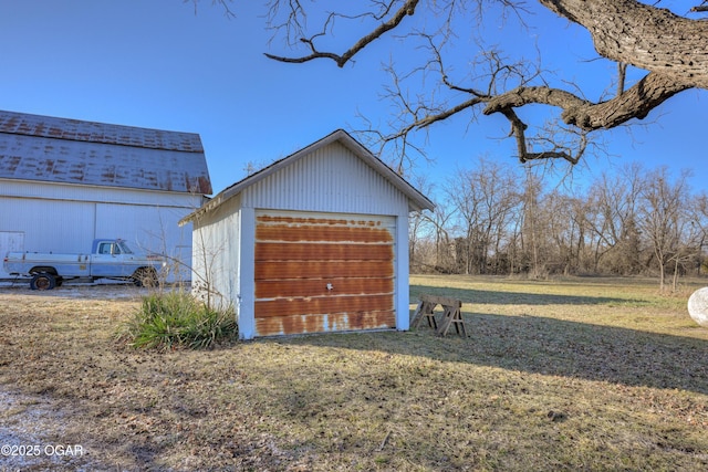 garage with a yard