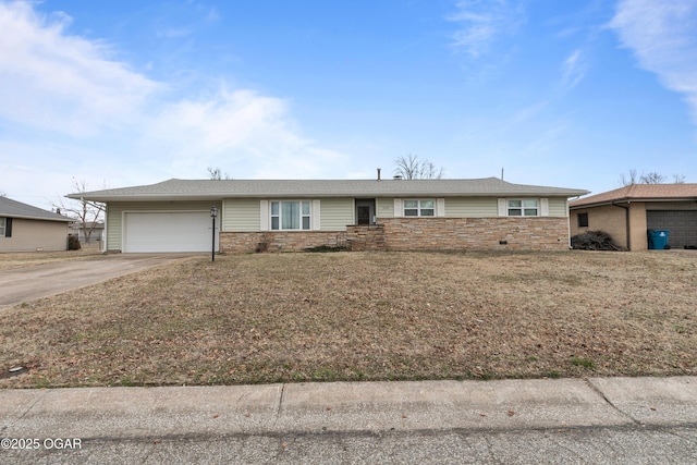 ranch-style house featuring a garage