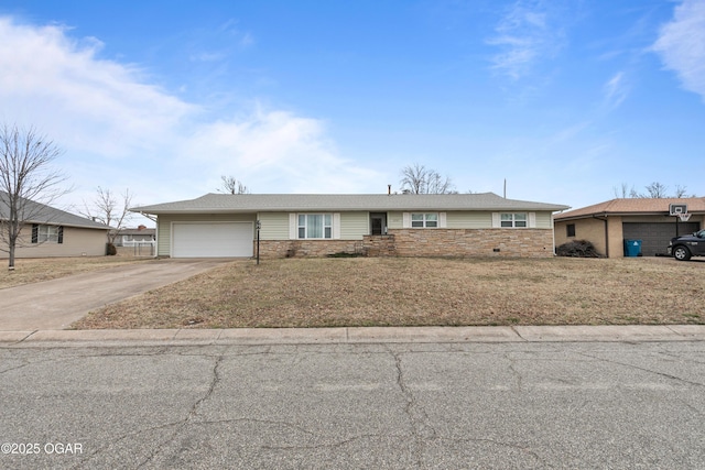 single story home featuring a garage and a front lawn