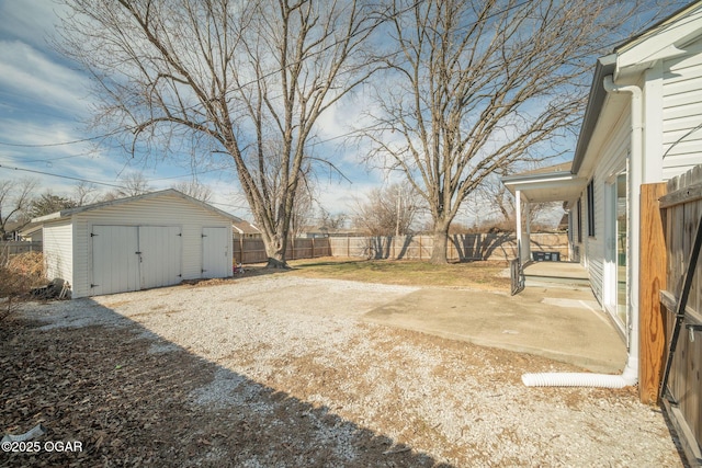 view of yard with a patio and a shed