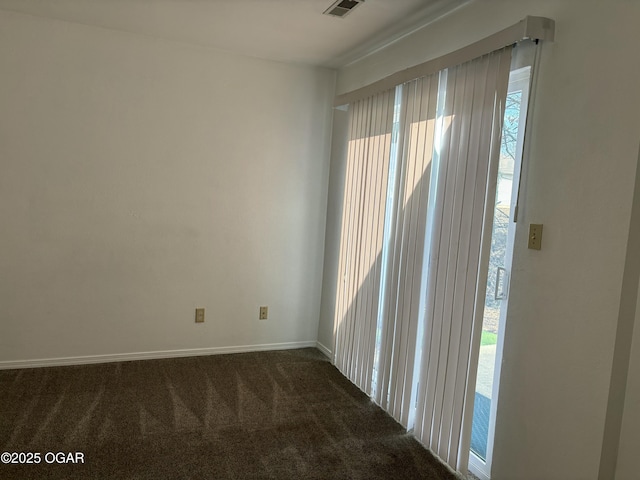 view of carpeted spare room