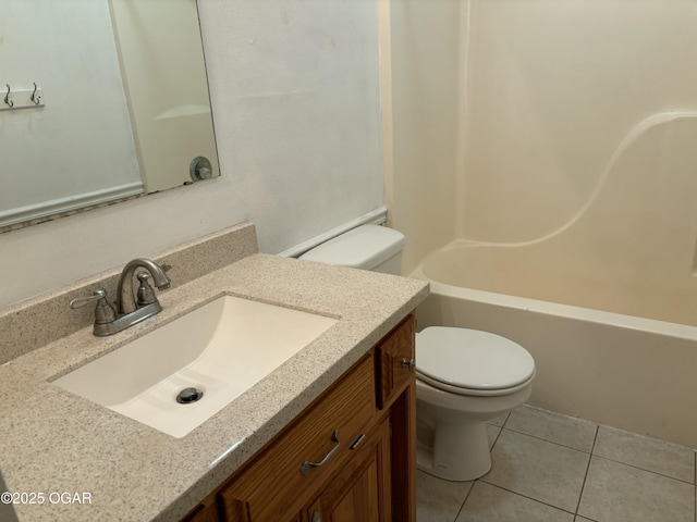 full bathroom with tile patterned floors, toilet, shower / bathing tub combination, and vanity