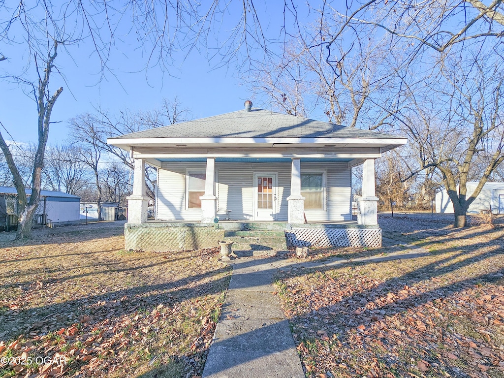 bungalow-style house with covered porch