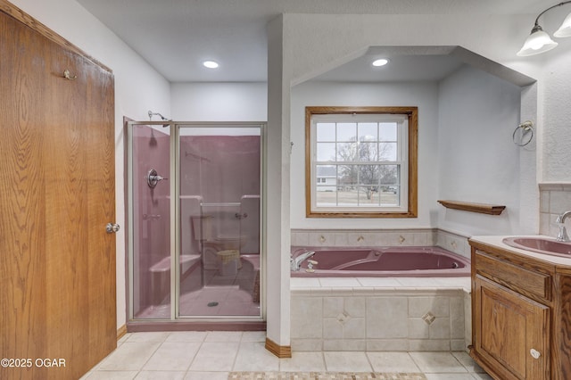 bathroom with vanity, separate shower and tub, and tile patterned floors