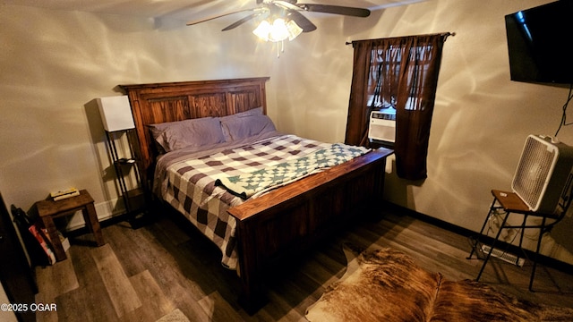 bedroom with hardwood / wood-style floors and ceiling fan