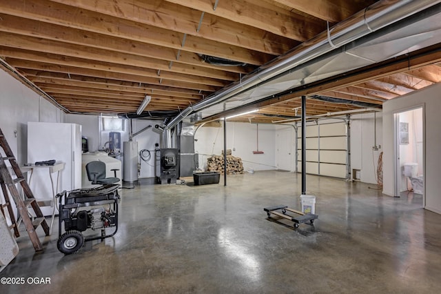 basement featuring gas water heater