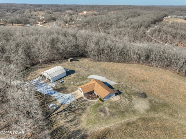 birds eye view of property featuring a rural view