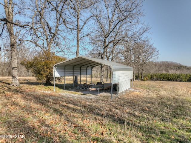 view of outbuilding with a carport