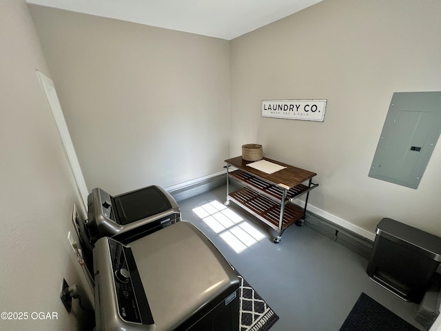 laundry area with separate washer and dryer and electric panel