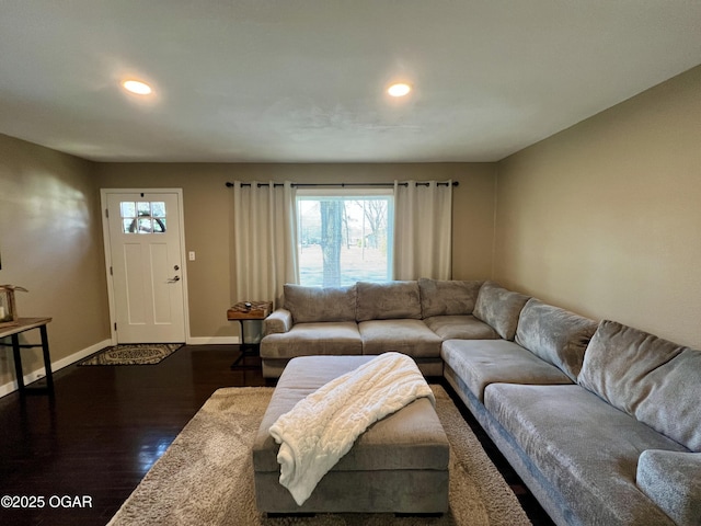 living room featuring dark wood-type flooring