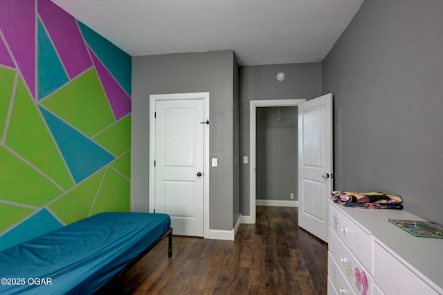 bedroom featuring dark hardwood / wood-style floors