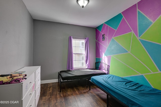 bedroom featuring dark hardwood / wood-style floors